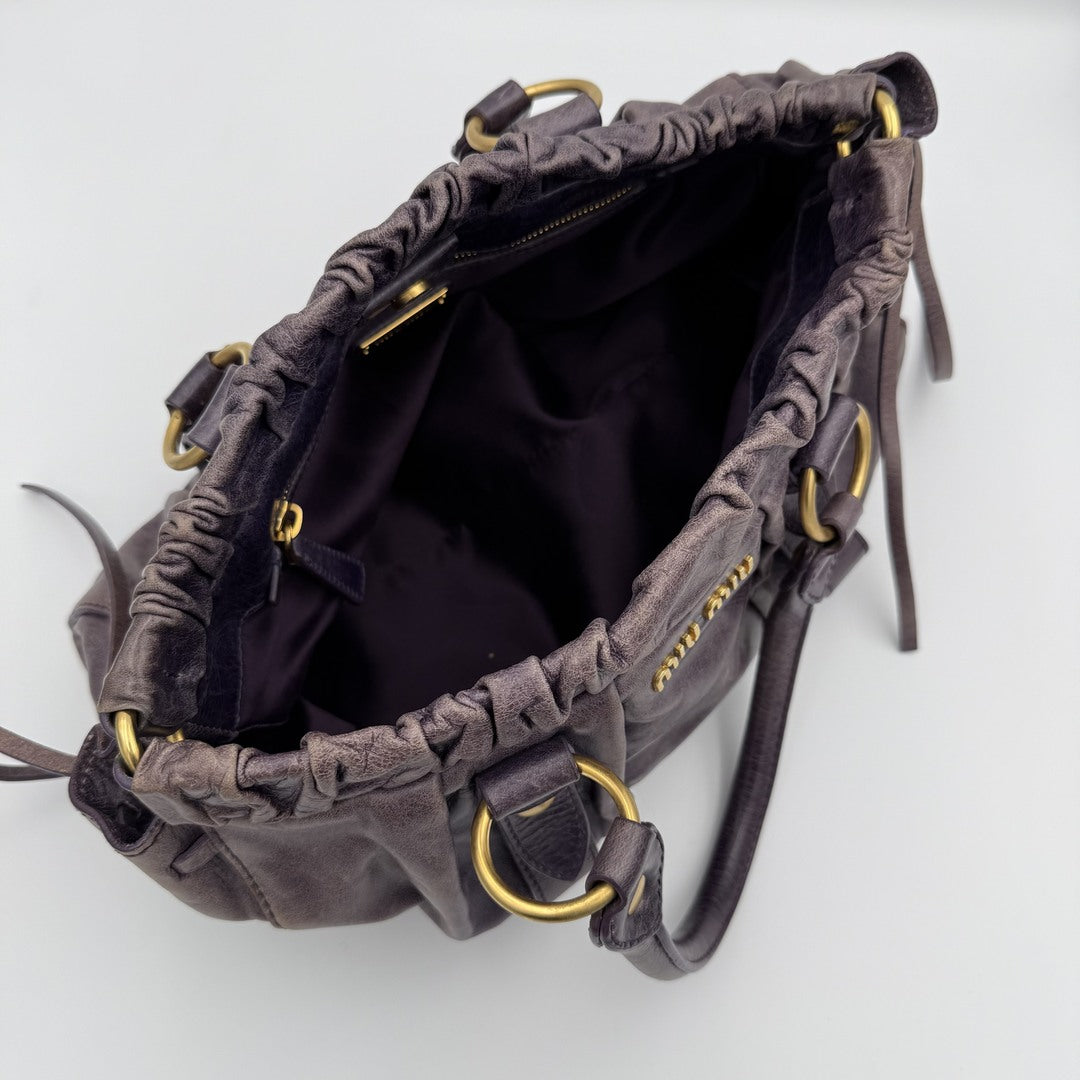 PreOwned Miu Miu Vitello Purple Leather Handbag