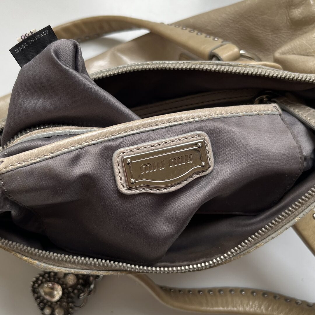 PreOwned Miu Miu Studded Charm Leather Beige Shoulder Bag