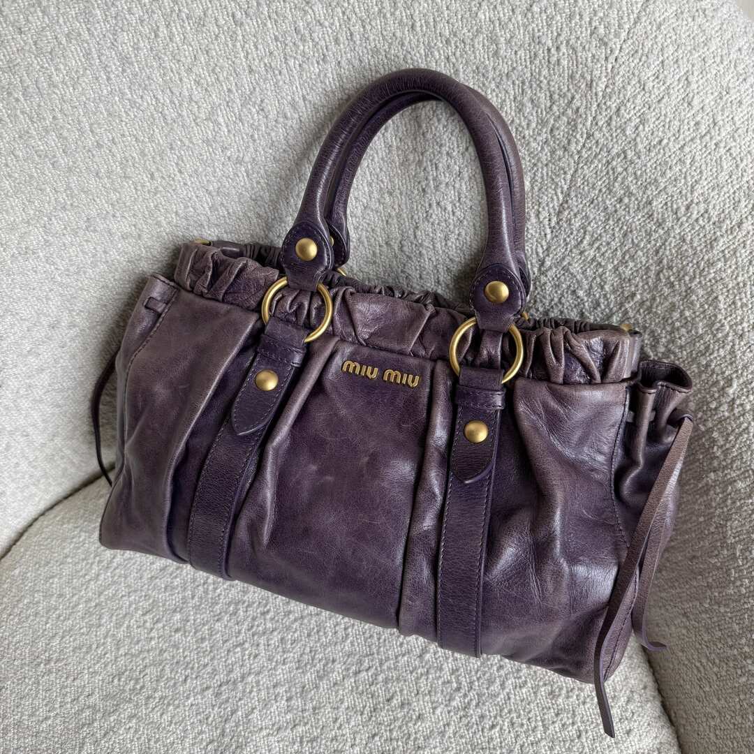 PreOwned Miu Miu Vitello Purple Leather Handbag