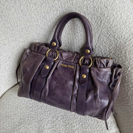 PreOwned Miu Miu Vitello Purple Leather Handbag